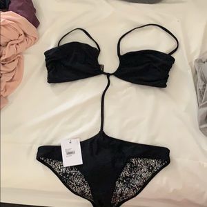 One piece reversible by ONE teaspoon